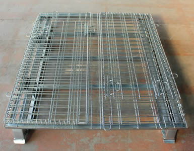 A folded non-standard wire container with bright surface is on the floor.